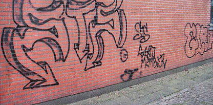 Verwijderen van graffiti van muren